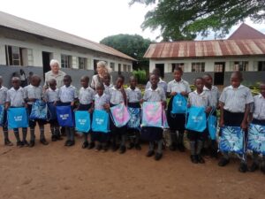 Children with gifts from the visitors