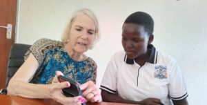 Dr. Prudy interacting with Immaculate